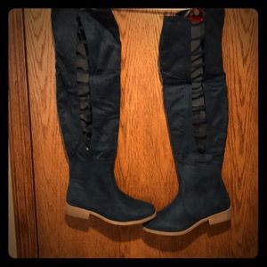 Woman’s navy boots